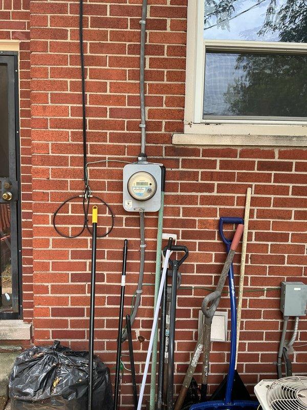 Conducted whole-home HVAC replacement estimate for existing furnace and air conditioning system. Inspected basement-located furnace and outdoor condensing unit positioned on concrete pad against building exterior, documented current equipment configuration including electrical connections, disconnect switches, and conduit routing. Provided customer with replacement options and recommendations for complete system upgrade.