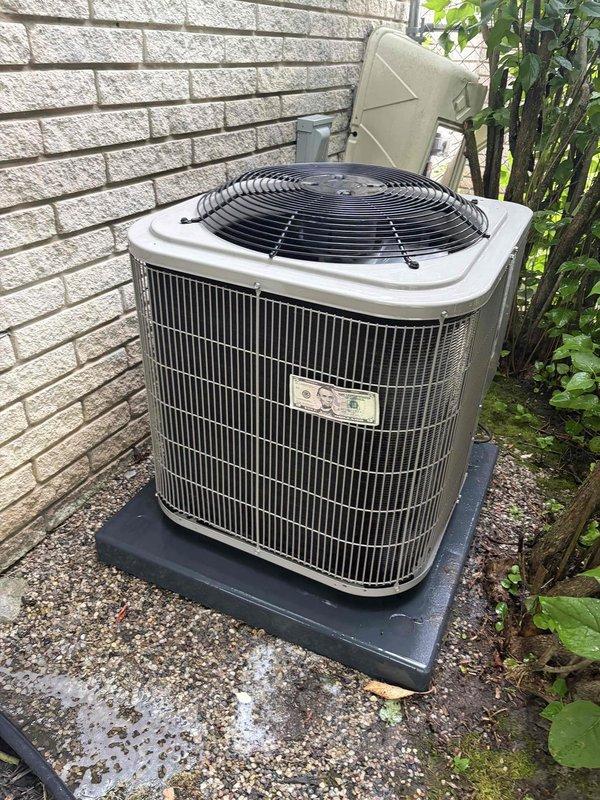 Completed comprehensive Gold AC Inspection on outdoor condensing unit approximately 4-5 years old. Performed full system evaluation including visual inspection of condenser coil fins, fan motor operation, and electrical connections at disconnect box. Verified refrigerant lines and insulation integrity on both interior and exterior components. Inspected indoor evaporator coil assembly, condensate drain system with PVC piping, and associated electrical junction box connections. All components operating within normal parameters with no deficiencies noted. System tested under load and confirmed proper cycling and temperature differential. Unit maintained in good working condition with no repairs required at this time.
