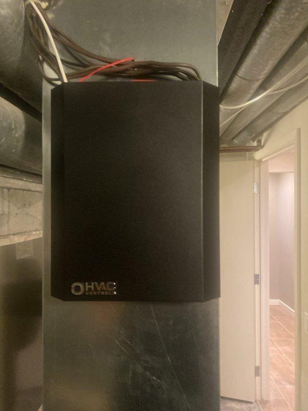 Installed Z600 zone control board on main supply duct to provide multi-zone temperature control for HVAC system. Mounted control board to cylindrical sheet metal ductwork, completed all electrical connections including power and zone control wiring with proper wire terminations. Integrated zone control system with existing gas furnace and electrical control components, ensuring proper communication between thermostat controls and damper actuators. Modified and connected miscellaneous ductwork sections to accommodate zone control installation and optimize airflow distribution throughout the zoned areas.