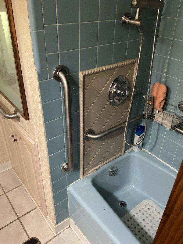 Responded to service call for malfunctioning toilet handle in main floor bathroom. Upon inspection, found toilet flush handle mechanism sticking in downward position, preventing proper return to neutral position after flushing. Disassembled flush handle assembly and identified worn internal components causing binding. Replaced defective flush handle mechanism with new assembly, ensuring proper spring tension and smooth operation. Tested flush cycle multiple times to verify handle returns to correct position without sticking. Unit now operates normally with full flush functionality restored.