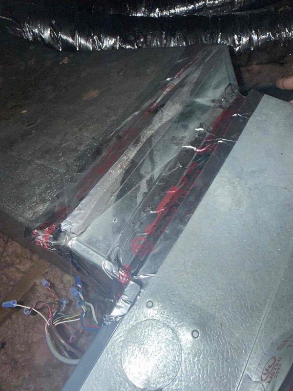 Responded to service call for 4-year-old AC system in attic blowing warm air only, with issue beginning shortly after recent maintenance inspection. Upon arrival, performed diagnostic evaluation of air handler unit and ductwork system. Inspection revealed deteriorated ductwork components with significant coating degradation and peeling on transition pieces and register boots. Assessed air handler cabinet condition, noting loose insulation material around equipment seams and edges. Checked electrical connections and service wiring. Provided complimentary filter replacement as part of pending Gold Plan service. System evaluated under parts warranty coverage.