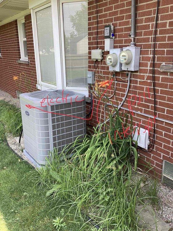 Responded to lead for Kohler generator installation assessment at residential property. Conducted site evaluation of exterior location near existing HVAC condenser unit and utility meters on brick wall, photographed current equipment layout and available space for generator placement. Documented electrical service access points and gas meter proximity to determine optimal installation configuration and utility connection requirements.