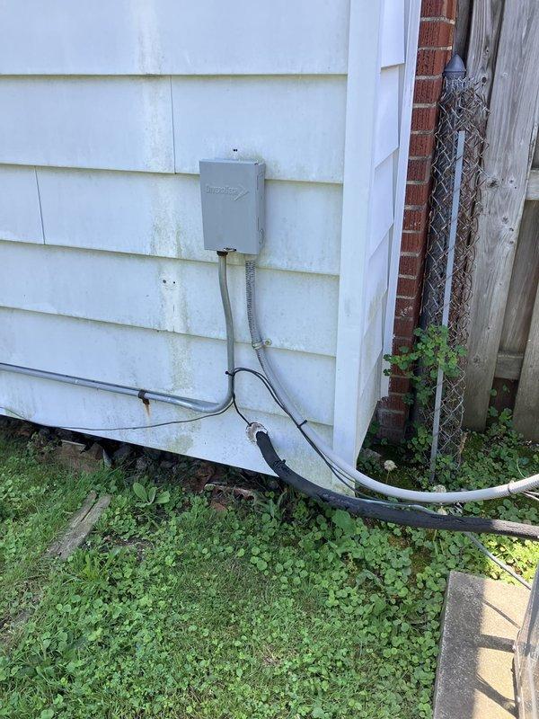 Conducted comprehensive estimate for AC system replacement due to short cycling issues on 10+ year old unit. Evaluated existing Carrier Puron system located in basement, assessed exterior condensing unit positioned on concrete pad in backyard, and documented current equipment condition including electrical connections, refrigerant lines, and mounting configuration. Provided homeowner with replacement options and specifications for new system installation to resolve operational concerns.
