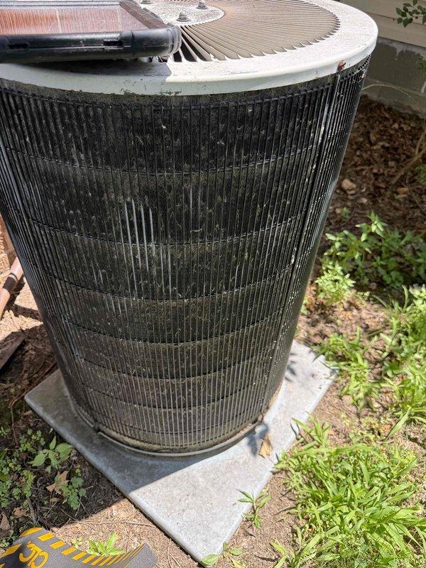Responded to no cooling call on approximately 30-year-old residential air conditioning system. Upon arrival, confirmed complete system failure with no power to outdoor condensing unit. Performed diagnostic evaluation of outdoor unit, which showed significant age-related deterioration including heavily soiled condenser coil with dirt accumulation, grime buildup on exterior fins, and overall weathering consistent with three decades of outdoor exposure. Inspected blower wheel assembly and internal components. Due to the advanced age of the equipment (30 years old, well beyond typical 15-20 year lifespan), recommended complete system replacement rather than repair, as replacement parts for equipment of this vintage are difficult to source and investing in repairs would not be cost-effective. Discussed replacement options with customer for new, energy-efficient system installation.