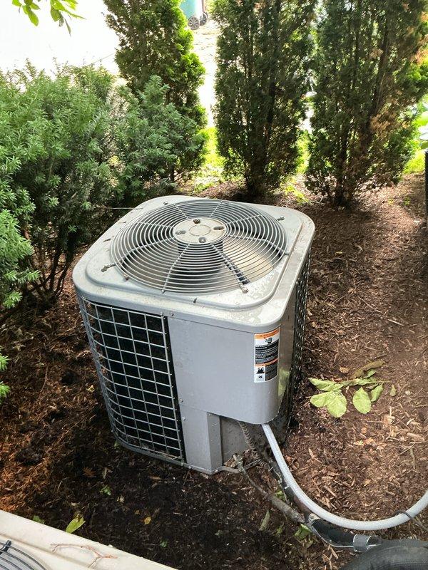 Completed comprehensive Gold AC Inspection on 5-year-old residential air conditioning system with air handler located in basement. Performed thorough evaluation of outdoor condenser unit, inspecting fan motor operation, refrigerant line connections, electrical components, and overall system performance. Verified proper system operation, checked refrigerant levels, cleaned condenser coils, and confirmed adequate airflow through unit. System found to be operating within normal parameters with no immediate service needs identified.