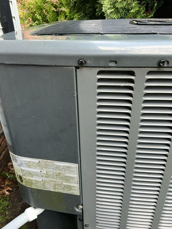 Completed comprehensive Gold AC inspection on 5-year-old residential air conditioning system. Performed thorough examination of outdoor condensing unit, confirming proper operation of all components. Inspected electrical disconnect, refrigerant line set, and condensate drainage system. Verified unit is functioning correctly with no immediate service needs identified. Checked cabinet condition, fan assembly, and protective grille. Documented equipment condition with photographs showing unit positioned on exterior pad with proper clearances maintained. All safety labels present and legible. System operating within normal parameters at time of inspection.