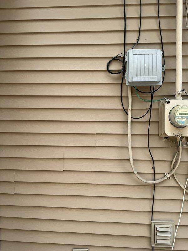 Conducted site assessment for Kohler generator installation estimate at residential property. Evaluated existing electrical service infrastructure including meter location, available conduit pathways, and exterior wall mounting options for transfer switch and generator connection. Documented current electrical panel configuration, service entrance equipment, and identified optimal positioning for generator unit relative to existing utility connections and building ventilation requirements.