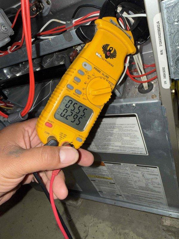 Performed comprehensive Gold AC Inspection on backyard air conditioning unit. Conducted electrical diagnostics using digital multimeter to verify system voltages and amperage readings. Inspected and tested 10μF capacitor, confirming proper electrical connections and secure mounting. All wiring terminals examined for tightness and integrity, with no signs of overheating or corrosion detected. System operating within normal parameters with no deficiencies noted.