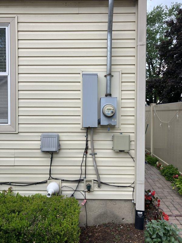 Conducted comprehensive site evaluation for whole-house Generac generator installation to support complete home electrical loads including HVAC system, furnace, and all household circuits. Assessed existing electrical service configuration, meter location, and available installation space in backyard area adjacent to exterior utility connections. Provided equipment sizing recommendations and complete installation scope for automatic standby generator system with necessary transfer switch and electrical integration requirements.