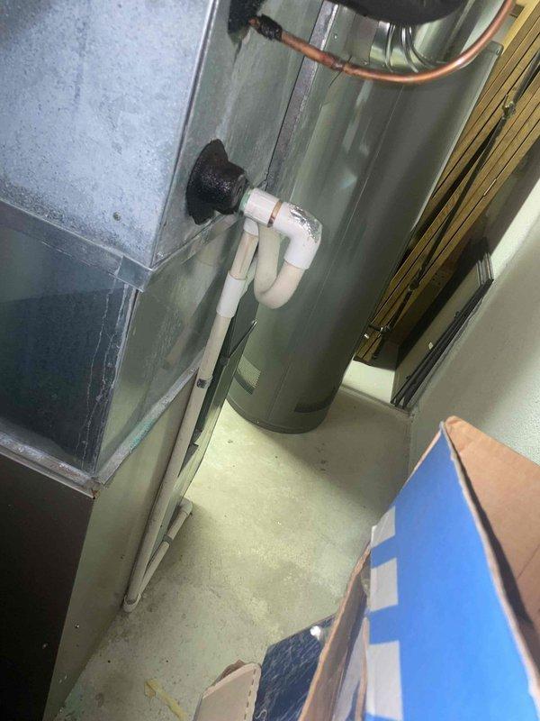 Responded to service call for air conditioning system failing to maintain setpoint temperature following extended power outage. System operational but unable to cool residence to thermostat setting of 77°F, with indoor temperature reading 81°F. Conducted comprehensive system evaluation of existing Bryant air handler and cooling equipment located in basement utility area. Assessed refrigerant levels, electrical connections, and overall system performance post-power restoration. Based on equipment age, condition assessment, and performance deficiencies, provided detailed estimate for complete HVAC system replacement including new air handler unit, condensing unit, refrigerant line set, electrical connections, condensate drainage system, and associated installation materials. Documented existing equipment configuration including current air handler mounting, ductwork connections, and utility room layout to ensure proper replacement specifications. Photographed existing installation showin