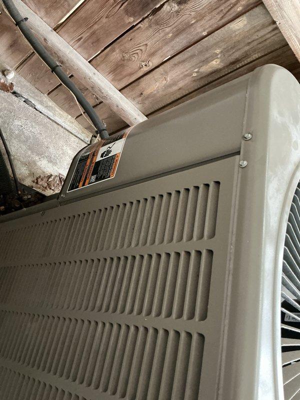 Responded to no cooling call on 2-year-old residential AC system. Upon arrival, confirmed heating mode operational but no cooling output. Inspected outdoor condenser unit and indoor air handler located in center of house. Performed diagnostic testing on both components, checked refrigerant levels, electrical connections, and thermostat communication. Identified issue preventing cooling cycle from engaging. Completed necessary repairs to restore full cooling functionality. System tested and verified operating properly in cooling mode before departure.