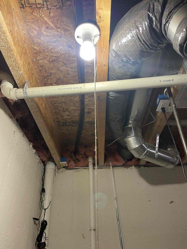 Conducted on-site evaluation of existing 113ANA042-C split air conditioning system experiencing chronic annual refrigerant loss. Performed visual inspection of outdoor condenser unit mounted on exterior brick wall and indoor air handler components in attic space. Documented current system configuration including flexible ductwork installation and existing refrigerant lines. Assessed equipment age, condition, and ongoing maintenance requirements. Provided replacement options and recommendations to address recurring refrigerant loss issue and improve system reliability.