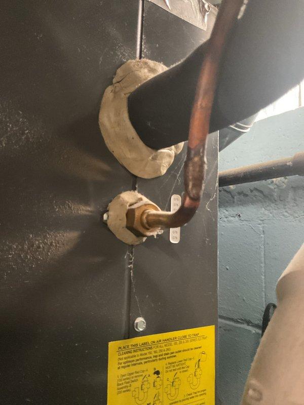 Completed comprehensive Gold AC inspection on 9-year-old residential air conditioning system with air handler located in basement. Verified equipment operational status, inspected refrigerant lines with foam insulation sleeves and copper piping connections, and documented all system components including mechanical infrastructure. Customer renewed Gold Plan coverage on-site following successful inspection of single-unit system.