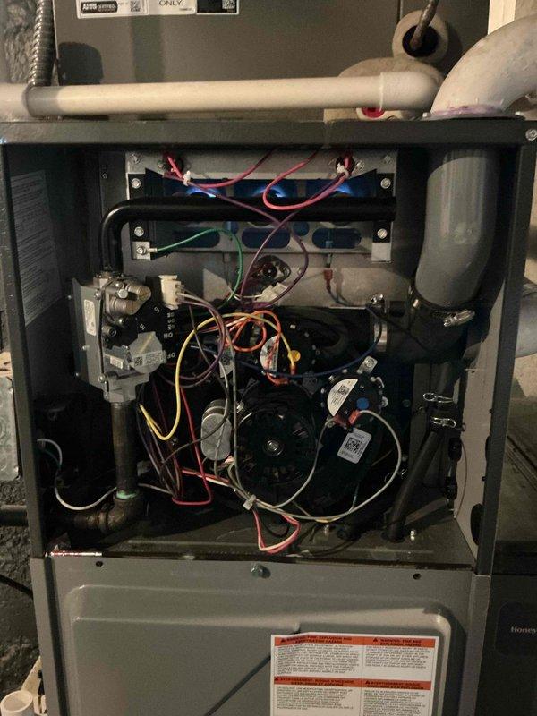 Completed city rental certification inspection on 2022 furnace unit located in basement. Performed comprehensive tune-up including inspection of gas valve assembly, blower motor, electrical connections, and internal components. Inspection also included evaluation of humidifier, thermostat, and hot water tank as required for certification compliance, with all systems found to be in operational condition.