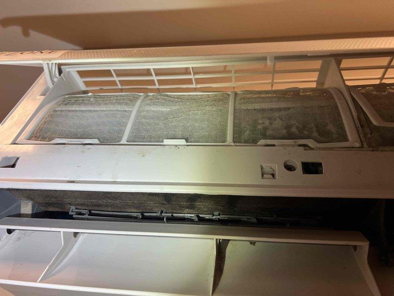 Responded to ice build-up issue on 10-year-old mini split system serving wine cellar. Upon arrival, unit was still in thawing process despite prior recommendation to power down 24 hours before appointment. Performed initial inspection, documented heavily soiled air filters with significant dust and debris accumulation, and assessed accessible components. Due to incomplete thawing of evaporator coil, unable to complete full diagnostic at this time. Follow-up visit required to finalize troubleshooting once unit has fully thawed and can be safely evaluated for underlying causes of ice formation, which may include refrigerant levels, airflow restrictions, or control issues.