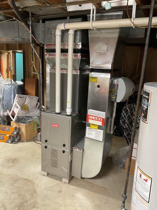 Completed installation of 2.5-ton air conditioning system with matching evaporator coil in rear yard location. Installed new condensate pump and drainage system, reconnected all electrical and refrigerant lines to existing furnace, and verified proper system operation. Mechanical, electrical, and air conditioning permits were obtained prior to installation, and system qualifies for applicable utility rebates.