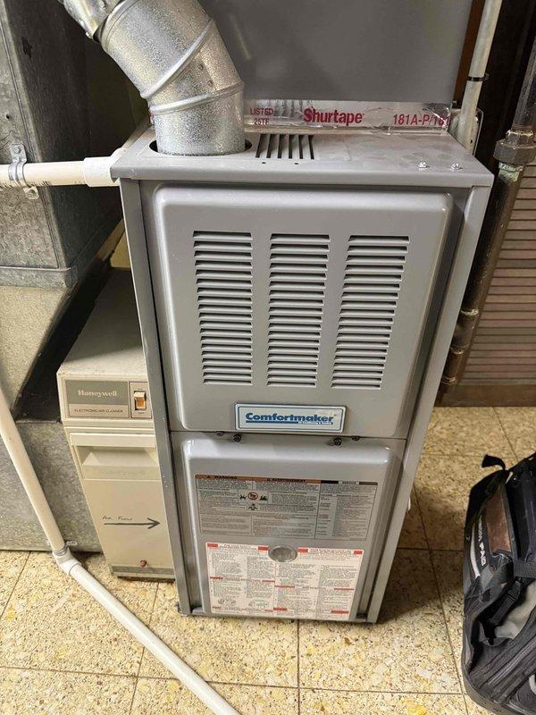 Responded to no cooling complaint on 20+ year old residential air conditioning system. Upon arrival, confirmed outdoor condenser unit fan motor was inoperative while compressor remained functional. Performed diagnostic evaluation and determined fan motor failure as root cause of cooling loss. Given the age of the equipment and extent of wear observed on the condenser coil, provided customer with repair versus replacement options. Customer elected to proceed with call diagnosis only at this time. System left in non-operational state pending customer decision on recommended repairs.