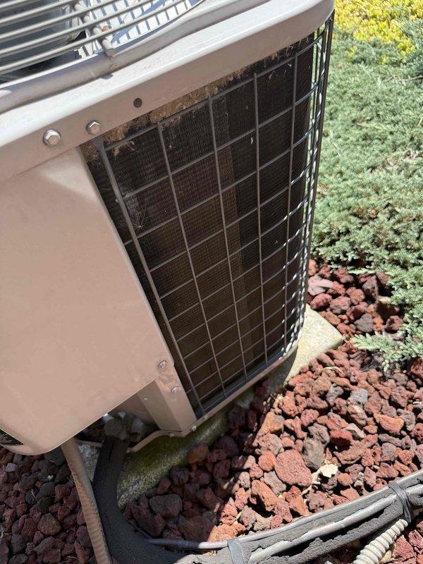 Responded to no cooling complaint on 20+ year old residential air conditioning system. Upon arrival, confirmed outdoor condenser unit fan motor was inoperative while compressor remained functional. Performed diagnostic evaluation and determined fan motor failure as root cause of cooling loss. Given the age of the equipment and extent of wear observed on the condenser coil, provided customer with repair versus replacement options. Customer elected to proceed with call diagnosis only at this time. System left in non-operational state pending customer decision on recommended repairs.