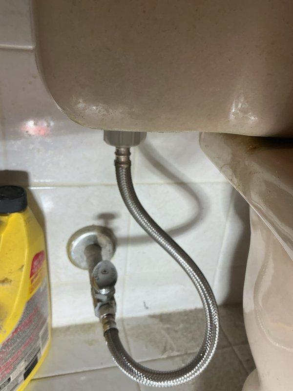 Completed faucet installation in confined workspace requiring specialized access considerations. Successfully installed new faucet fixture with appropriate supply line connections, ensuring proper water flow and leak-free operation upon completion.