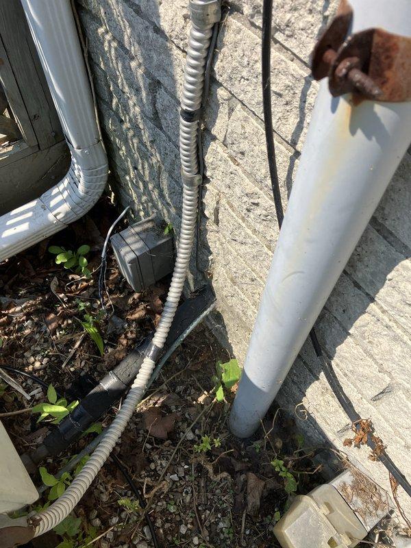 Provided estimate for complete HVAC system replacement including air conditioning unit and natural gas furnace for basement installation. Current 10+ year old equipment is non-operational. Assessment included evaluation of existing electrical service, exterior conduit routing, and PVC condensate drainage configuration to determine replacement specifications and installation requirements.