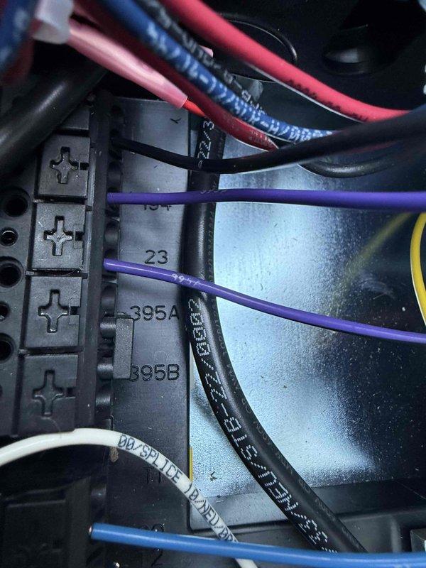 Responded to service call for 18KW Generac generator displaying error codes 2780 and 2738. Upon arrival, performed diagnostic evaluation to identify fault conditions. Error code 2780 indicated overcrank condition while error code 2738 pointed to RPM sensor loss of signal issue.

Inspected generator control panel and wiring harness connections. Removed access panels to examine internal electrical components and sensor wiring. Located loose and corroded connections at the RPM sensor terminal block affecting signal transmission to the controller. Identified additional concerns with fuse holder assembly and associated relay connections showing signs of thermal stress and poor contact.

Disconnected battery negative terminal and de-energized system per safety protocols. Removed affected wire terminals from connection points and cleaned contact surfaces to ensure proper electrical continuity. Inspected all wire insulation for damage or deterioration. Re-terminated loose connections at termin