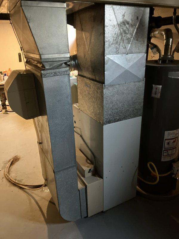 Completed comprehensive HVAC system evaluation on 20-year-old residential air conditioning system experiencing reduced cooling capacity and refrigerant line icing at the condenser. Inspection revealed cracked heat exchanger in basement furnace unit and low refrigerant charge in the AC system. Provided full system estimate for replacement of both indoor and outdoor equipment due to age of components and extent of required repairs exceeding cost-effectiveness of individual component replacement.