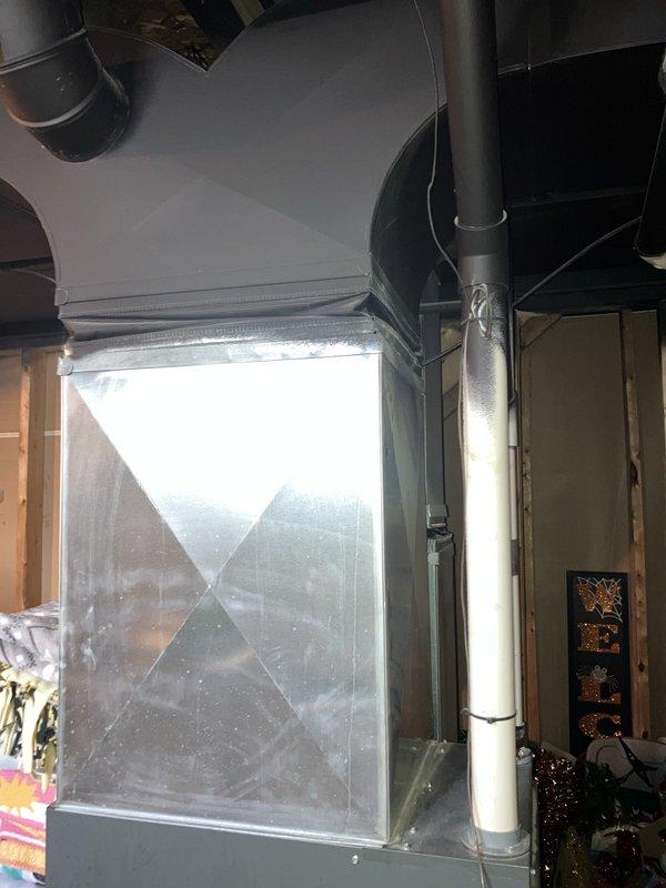 Conducted site assessment for new air conditioning system installation at residential property with no existing AC equipment. Evaluated exterior wall location near electrical meter for outdoor condenser unit placement and inspected basement area with existing ductwork infrastructure. Documented electrical service availability, examined current HVAC duct system configuration, and assessed installation requirements including electrical connections, refrigerant line routing, and condensate drainage pathways. Provided comprehensive equipment replacement estimate for complete AC system installation utilizing existing ductwork distribution system.