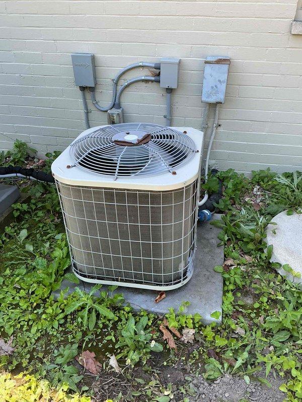 Completed Gold AC Inspection on two outdoor condensing units, both over 10 years old. Performed comprehensive system evaluation including visual inspection of both units, which showed normal age-related wear with some surface rust and discoloration on exterior housing. Verified proper operation of both systems, inspected electrical connections and conduit, confirmed units are level on concrete pads, and checked refrigerant lines. Air handler/coil located in basement was inspected as part of multi-unit system assessment. Both systems currently operating as designed with homeowner present for inspection walkthrough.