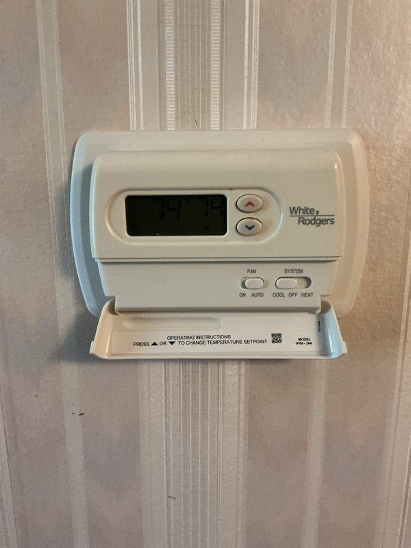 Completed yearly AC tune-up and inspection on 3-year-old residential air conditioning system as part of prepaid maintenance program. Performed comprehensive evaluation of indoor furnace unit and thermostat operation, verified proper system controls and temperature regulation functionality. Documented equipment conditions including White-Rodgers programmable thermostat, gas furnace with PVC venting, and associated HVAC components, confirming all systems operating within normal parameters.