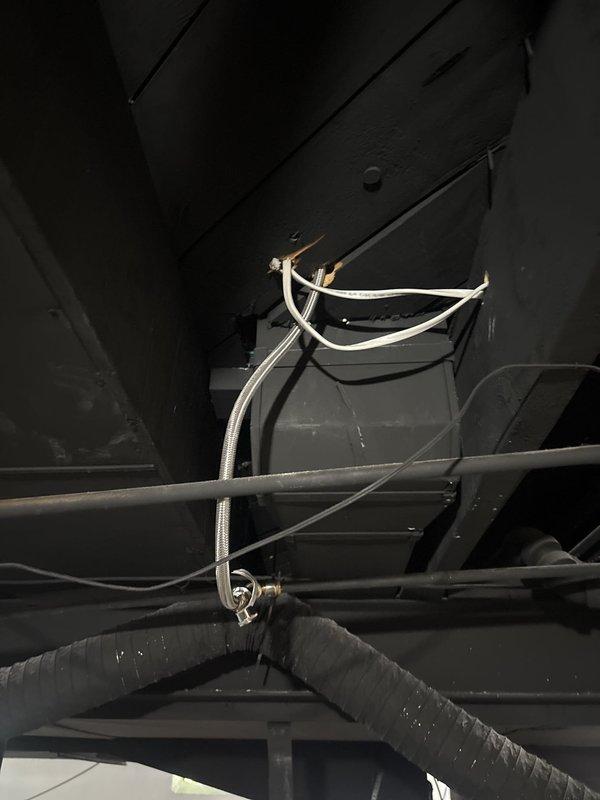 Responded to service call for multiple electrical issues throughout the property. Addressed faulty outlets, switches, and wiring concerns as part of coordinated work alongside HVAC installation and plumbing services. Installed GFCI receptacle with proper ground fault protection, secured all wire connections with appropriate connectors, and verified proper mounting within electrical box. Inspected and organized wiring runs through mechanical spaces to ensure code compliance and prevent interference with ductwork and other building systems. All electrical connections tested for proper function and safety prior to completing installation.