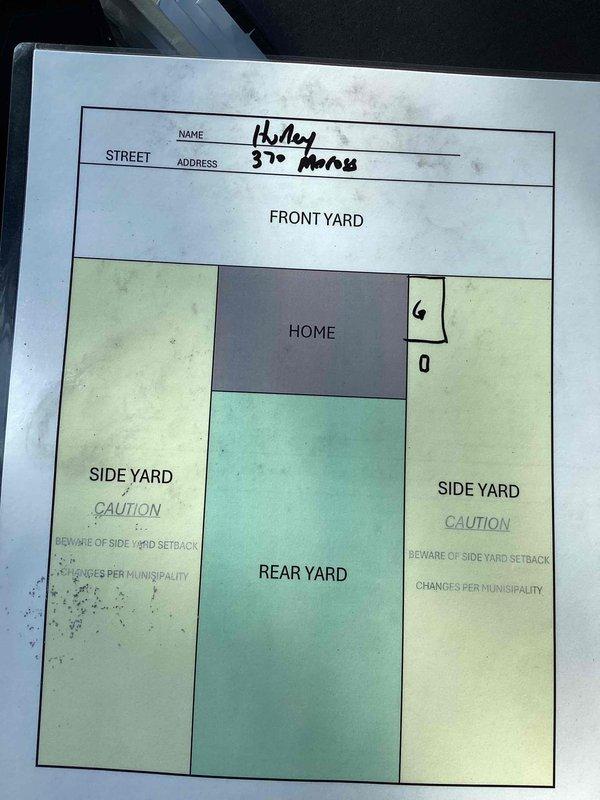 Conducted comprehensive site assessment for whole house generator installation at residential property. Evaluated electrical infrastructure in basement, documenting existing electrical panel location, conduit routing, and available space for transfer switch installation. Reviewed property plot plan to determine optimal generator placement considering municipal setback requirements, utility access, and fuel line routing from structure to proposed pad location. Photographed existing electrical system and created preliminary site diagram for equipment specifications and permit application.