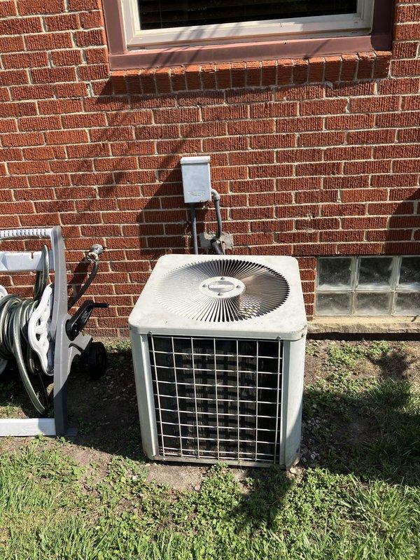 Completed full HVAC system replacement for 25-year-old equipment consisting of air conditioning unit and furnace. Installed new outdoor condensing unit on existing concrete pad with proper refrigerant line routing along exterior brick wall to new basement furnace installation. Established electrical disconnect, completed all necessary connections, and verified system operation.