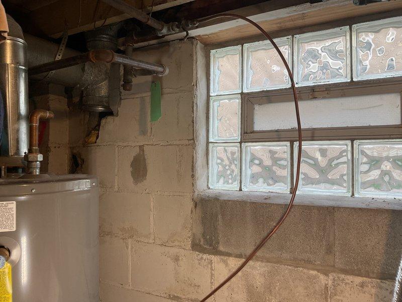 Performed plumbing estimate for gas line assessment in basement of 60+ year old home requiring correction or update for new dryer installation. Inspected existing gas piping configuration, which was suspected to be improperly sized or routed for dryer connection. Evaluated copper gas lines, shutoff valves, and existing mechanical connections in utility area. Documented current piping layout and identified necessary modifications to bring gas supply up to code for safe dryer operation. Provided recommendations for proper gas line sizing, routing, and installation to meet current building codes and manufacturer specifications.