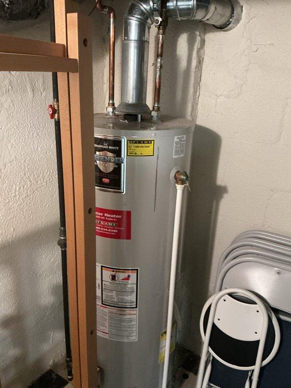 # HVAC Maintenance - Gold AC Inspection

Performed comprehensive Gold-level preventive maintenance on 2018 residential air conditioning system. Conducted complete system inspection including refrigerant level verification, electrical connection testing, capacitor analysis, and condenser coil cleaning. Evaluated airflow performance and confirmed proper thermostat operation. 

Inspected indoor air handling components including evaporator coil condition and condensate drain line functionality. Verified proper operation of Bryant humidifier unit integrated with HVAC system. Checked filter condition and confirmed adequate airflow through return air system. Examined water heater and associated HVAC equipment in mechanical room to ensure proper ventilation and clearances.

All system components operating within manufacturer specifications. No deficiencies identified. System ready for cooling season operation. Recommended continued annual maintenance to preserve equipment longevity and efficie