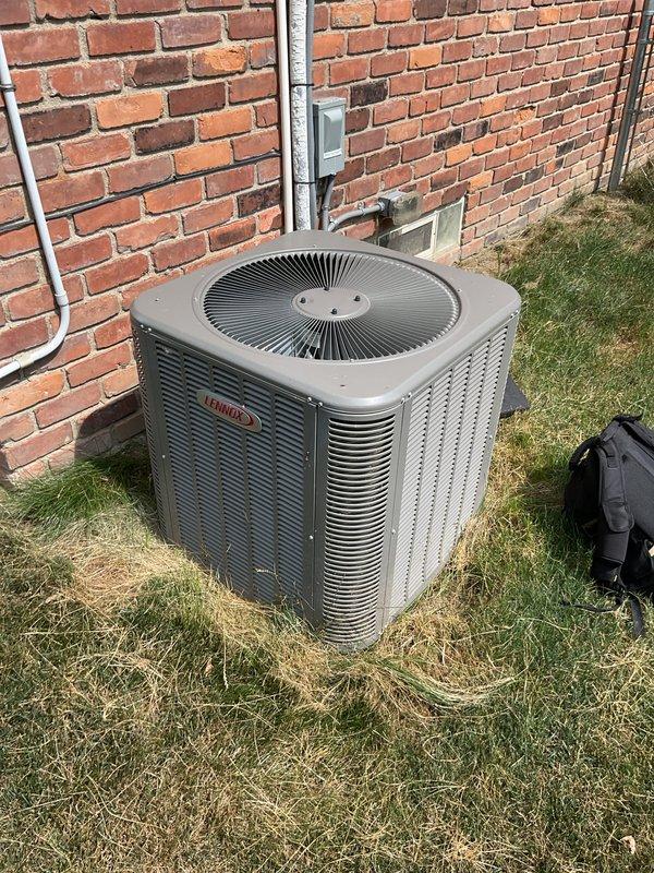 Completed comprehensive maintenance tune-up on Lennox air conditioning system located in attic. Inspected outdoor condenser unit, verified proper operation of condenser fan, checked refrigerant levels, and cleaned condenser coils. Examined indoor air handler components, inspected air return filter grille for proper airflow, and verified all electrical connections and controls were functioning within manufacturer specifications. System operating efficiently with no deficiencies noted.