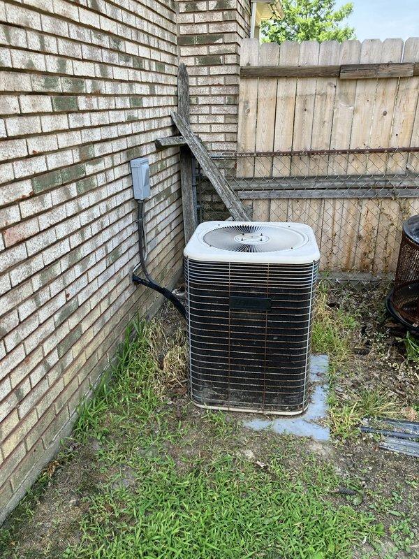 Conducted on-site assessment for complete HVAC system replacement including 22-year-old furnace and air conditioning unit, both located in basement. Evaluated existing outdoor condenser unit positioned on concrete pad against exterior wall, inspected electrical service panel and existing wiring configuration to determine compatibility requirements for new equipment installation.