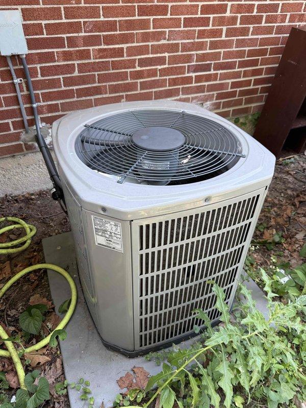 Responded to no cooling call on 14-year-old residential air conditioning system. Upon arrival, accessed outdoor condenser unit located on concrete pad against exterior brick wall. Performed visual inspection of outdoor unit and utilized inspection camera to examine indoor evaporator coil components in basement. System appeared to be older model with typical age-related wear. Documented equipment condition through photographs of both outdoor condenser unit and internal coil components for customer records. Completed diagnostic evaluation as requested under CWOW service agreement.