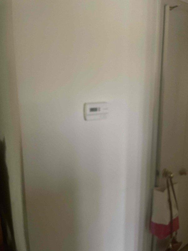 Responded to service call for air conditioning system not cooling. Upon arrival, evaluated 10-year-old outdoor AC unit that was running but failing to produce cool air. Conducted comprehensive system assessment and provided detailed estimate for complete system replacement due to age and current operational failure. Documented existing thermostat and indoor equipment configuration with photos for replacement planning purposes.