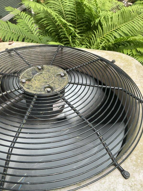 Completed comprehensive Gold AC Inspection on a 5-year-old Goodman model 113ANA048-J air conditioning system utilizing R410A refrigerant. Unit located on exterior concrete pad with adequate clearance and vegetation management. Performed full system evaluation including electrical connections, refrigerant pressures, condenser coil inspection, fan motor operation, and capacitor testing. All components operating within manufacturer specifications with no deficiencies noted. System demonstrated proper cooling capacity and airflow. Exterior cabinet showed normal weathering with minor surface growth, which does not affect performance. Documented unit specifications and captured photographic records of equipment condition for maintenance history.