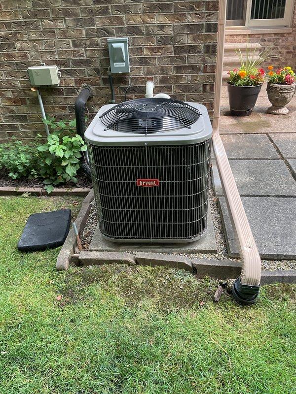 Completed comprehensive Gold AC Inspection on a 5-year-old Bryant air conditioning system with indoor air handler located in basement. Performed full system evaluation including inspection of outdoor condenser unit, verified proper operation of all components, checked refrigerant levels and electrical connections, and documented Trane humidifier control settings. System found to be operating within normal parameters with all equipment functioning properly at time of inspection.