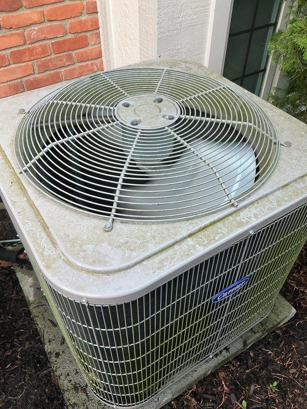 Completed Gold AC Inspection and cooling maintenance on residential HVAC system experiencing inconsistent temperature distribution across basement, first, and second floors. Performed comprehensive tune-up on outdoor condenser unit, which showed signs of age with weathering, dirt accumulation, and surface discoloration on cabinet and fan grille assembly. Inspected mini split system in garage and evaluated overall system performance to address cooling deficiencies reported on warm days.
