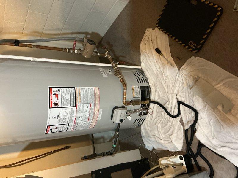 Replaced a non-functioning 75-gallon Bradford White water heater under warranty with a new 75-gallon Bradford White unit. Connected copper supply lines, pressure relief valve, and all necessary plumbing connections to restore hot water service. Expansion tank installation to be scheduled for follow-up visit.