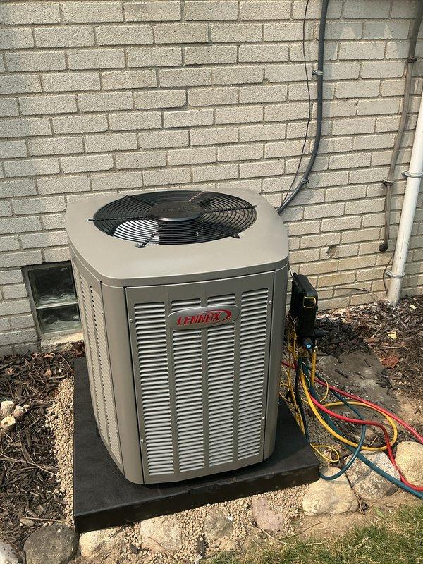 Completed full HVAC system installation including a 70,000 BTU furnace and 2-ton air conditioning unit. Installed Lennox condenser unit on exterior pad with proper refrigerant line connections, electrical conduit routing, and reconnection to existing electrical service. Mechanical permit requested for furnace and A/C installation. System positioned on right side of structure with all utility rebate documentation processed for consumer and DTE energy efficiency programs.