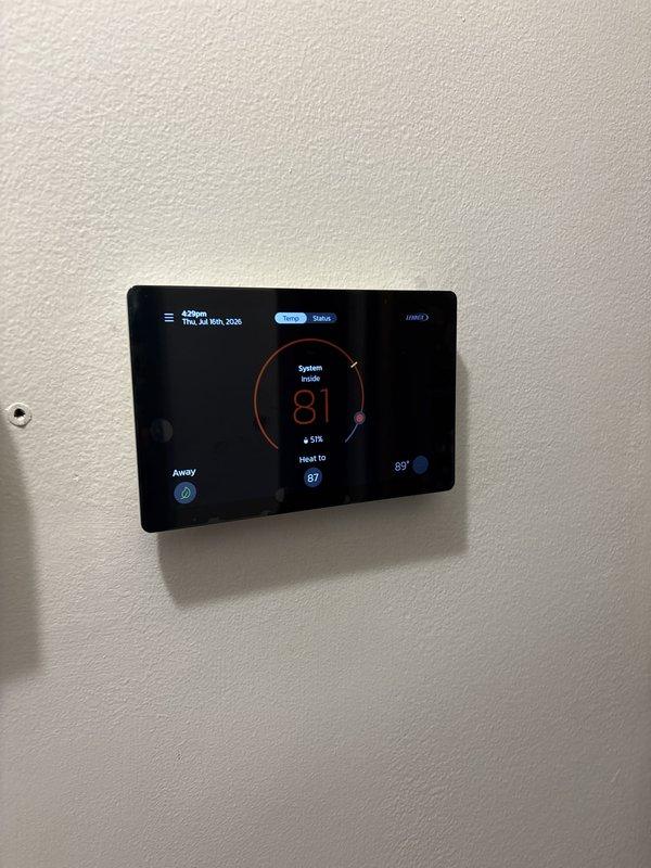 Completed full HVAC system installation including 70,000 BTU furnace and 3-ton air conditioning unit in rear yard location. Installed S40 thermostat, 600M humidifier, and reconnected existing ductwork with supply air remeasurement. Performed vacuum and refrigerant charging procedures using manifold gauges to verify proper system operation. Requested and obtained mechanical and electrical permits for installation. System qualified for utility rebates under AHRI certificate 216722046.
