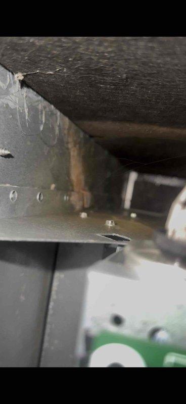 Responded to service call for furnace with reported standing water and condensate drainage issue. Upon inspection, found excessive moisture condensation and frost buildup throughout the interior compartment of the HVAC unit. Identified clogged condensate drain line as primary cause of water accumulation in unit bottom. Cleared blockage from drain system and verified proper drainage flow. Inspected evaporator coil area and confirmed frost formation due to restricted airflow from moisture buildup. Cleaned affected components and ensured all condensate lines were properly routed and secured. System tested and confirmed operational with proper heating function restored and drainage flowing correctly.
