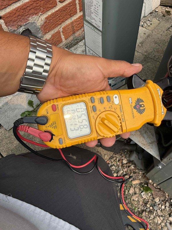 Responded to service call for air conditioning system not matching thermostat setting on 10+ year old cooling equipment. Upon arrival, performed diagnostic testing using clamp meter to verify electrical parameters and current draw at outdoor unit. Measured supply air temperature at 87.1°F using digital thermometer at supply duct, confirming inadequate cooling performance. Conducted comprehensive system evaluation including electrical connections, refrigerant circuit operation, and airflow measurements to identify root cause of temperature mismatch issue.