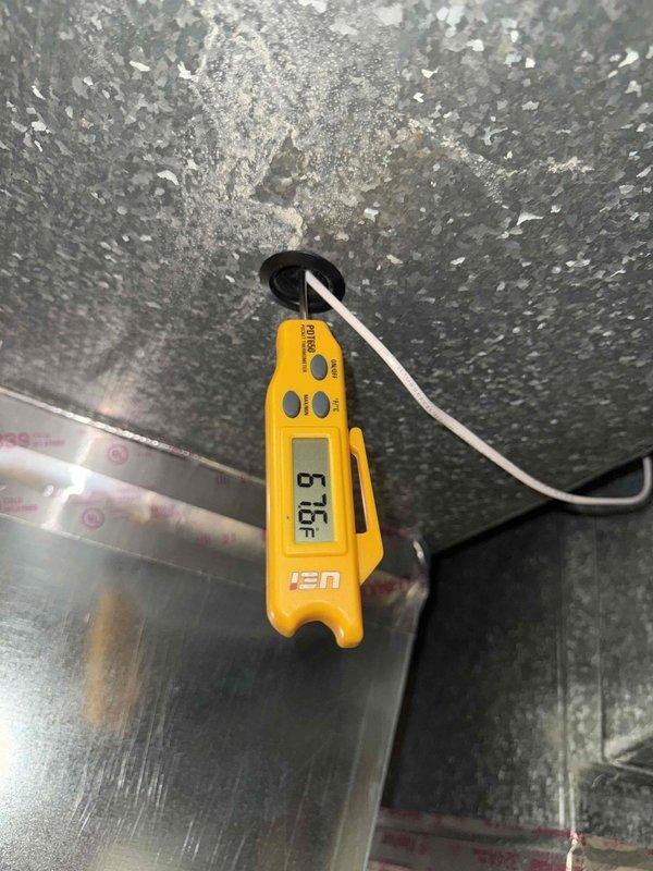 Responded to service call for air conditioning system not matching thermostat setting on 10+ year old cooling equipment. Upon arrival, performed diagnostic testing using clamp meter to verify electrical parameters and current draw at outdoor unit. Measured supply air temperature at 87.1°F using digital thermometer at supply duct, confirming inadequate cooling performance. Conducted comprehensive system evaluation including electrical connections, refrigerant circuit operation, and airflow measurements to identify root cause of temperature mismatch issue.