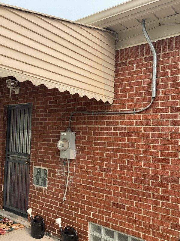 Conducted on-site evaluation for complete HVAC system replacement at residential property. Assessed existing Goodman furnace installation in basement utility area, noting current equipment configuration, ductwork connections, electrical wiring routing, and PVC condensate drainage system. Evaluated exterior electrical service location and clearances for potential outdoor condensing unit placement to provide comprehensive replacement estimate for new air conditioning and heating equipment.