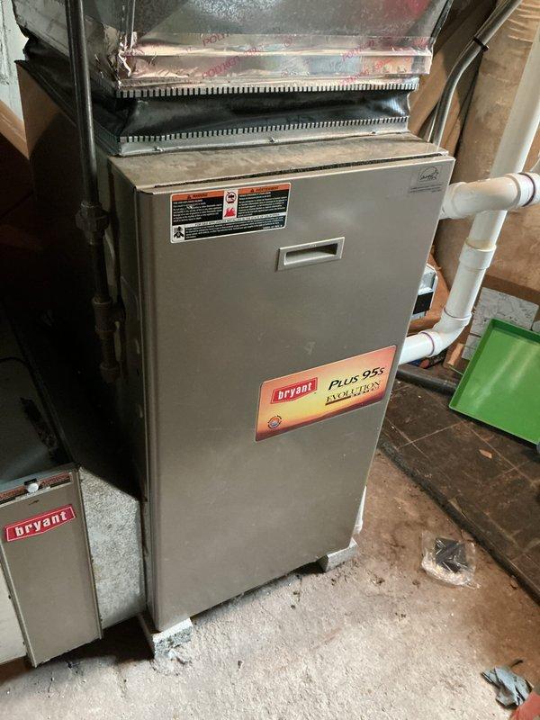 Responded to maintenance call for twelve-year-old Bryant Plus 90 furnace located in basement after high carbon monoxide readings were detected. Performed comprehensive system inspection and diagnostic testing, identifying compromised heat exchanger requiring immediate attention due to safety concerns. Provided detailed replacement estimate for new high-efficiency furnace system to address CO hazard and ensure safe operation.