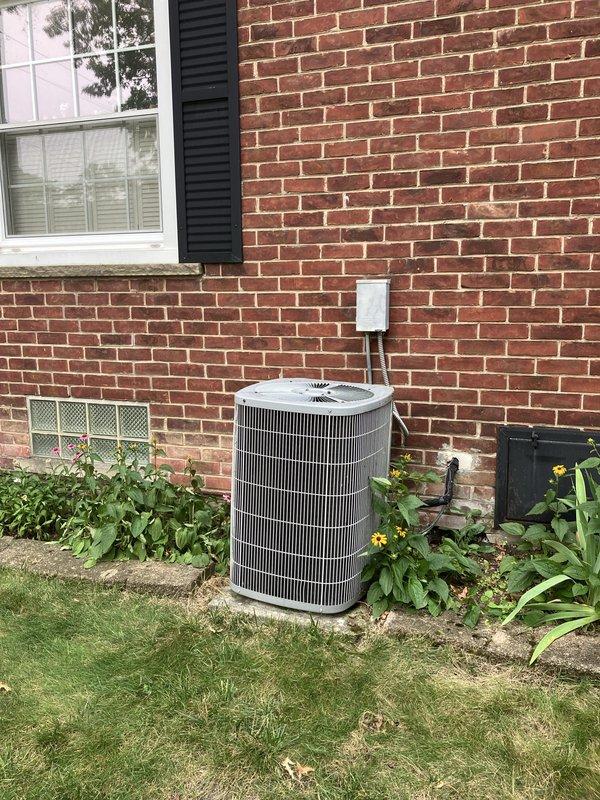 Completed comprehensive evaluation of 15-year-old residential air conditioning system that experienced complete cooling failure. Upon inspection, confirmed unit utilizes obsolete R22 refrigerant and identified cracked heat exchanger in furnace system. Given the age of equipment, refrigerant phase-out regulations, and critical furnace safety concern, provided detailed full system replacement estimate covering both heating and cooling components. Documented existing outdoor condenser unit condition and current installation configuration with photographic evidence for replacement planning purposes.